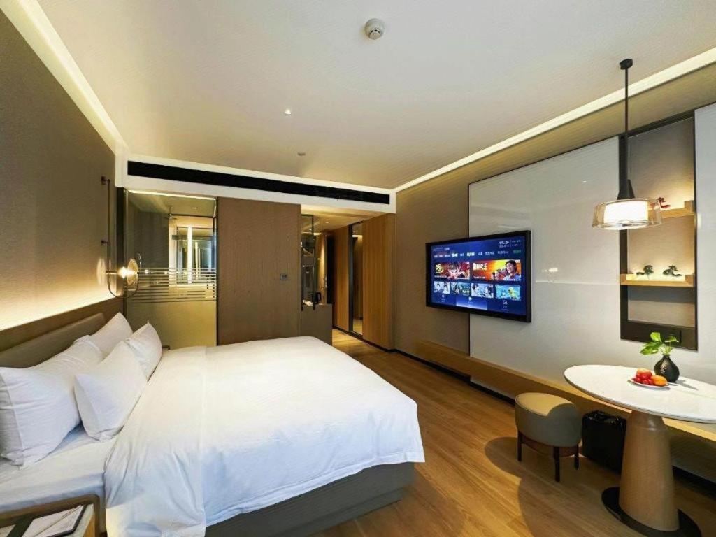 Zhangjiagang Jiangnan Garden Hotel Esterno foto