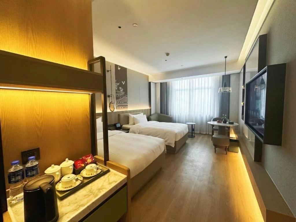 Zhangjiagang Jiangnan Garden Hotel Esterno foto