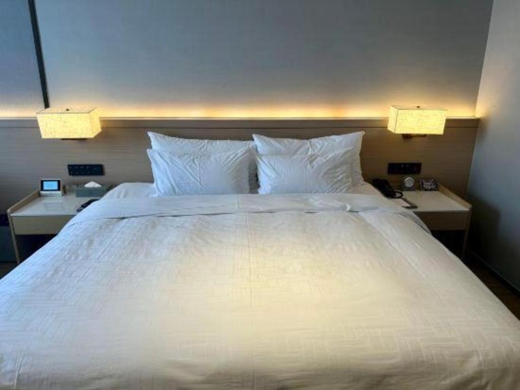 Zhangjiagang Jiangnan Garden Hotel Esterno foto