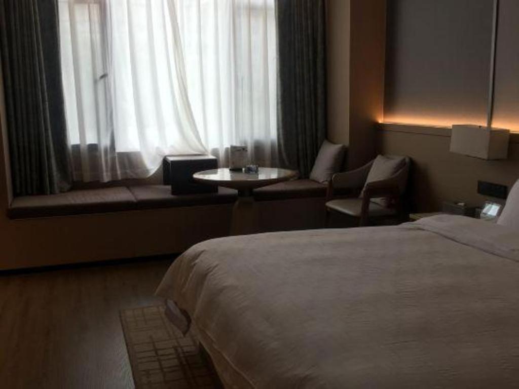 Zhangjiagang Jiangnan Garden Hotel Esterno foto