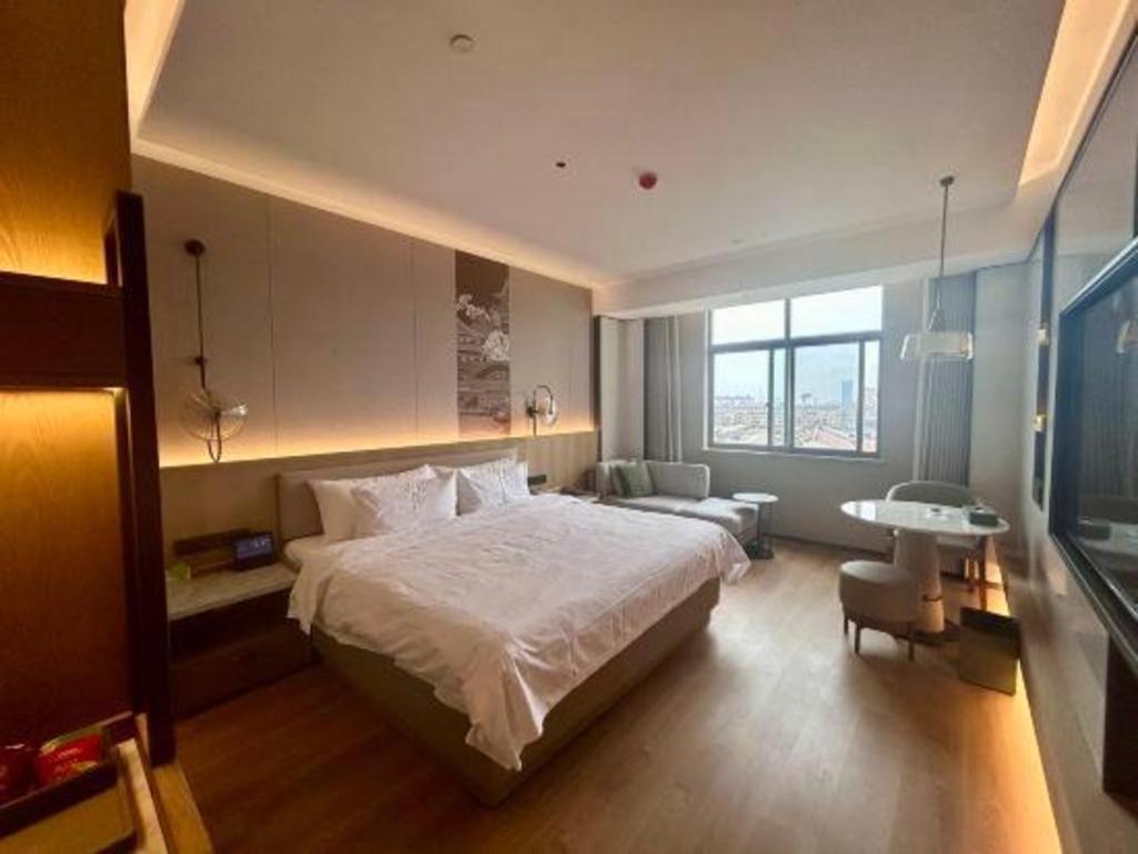 Zhangjiagang Jiangnan Garden Hotel Esterno foto