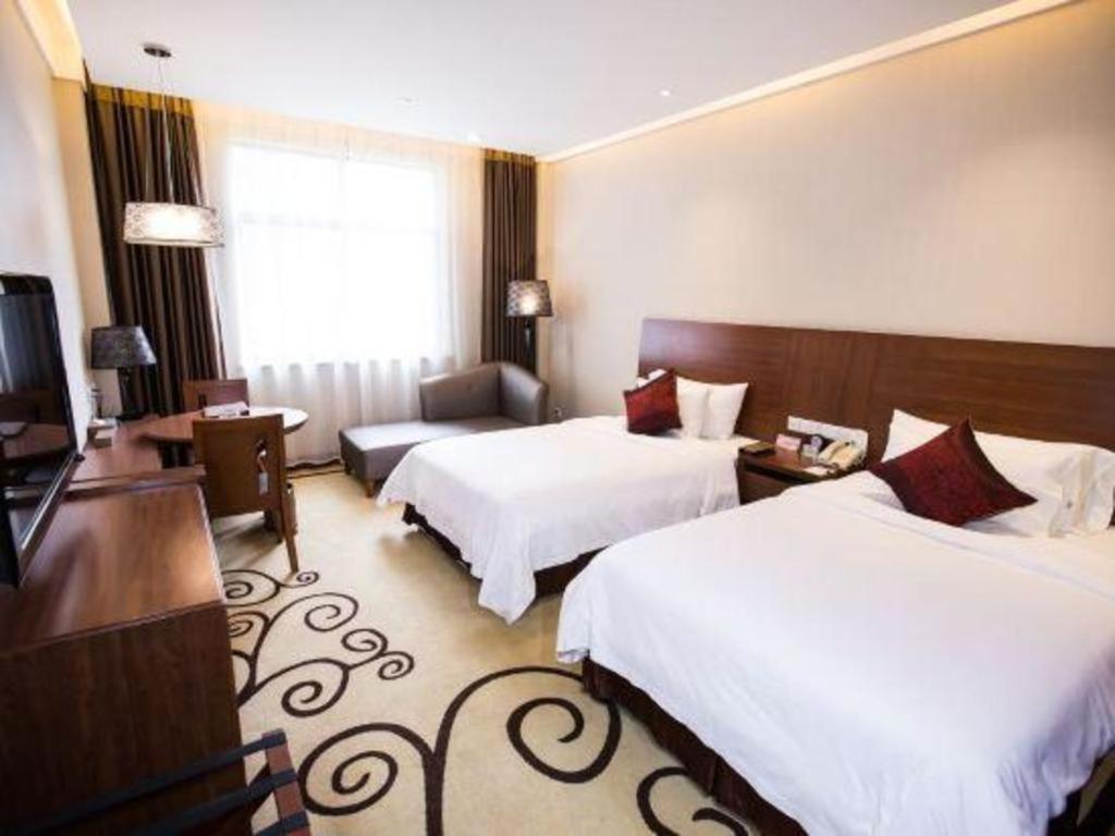 Zhangjiagang Jiangnan Garden Hotel Esterno foto